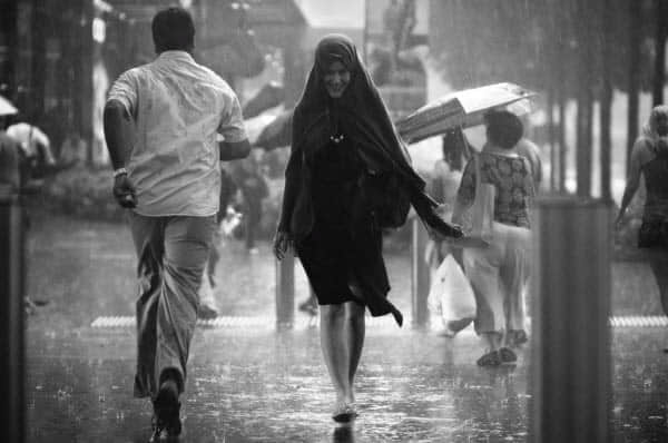 a smile in the rain Rainy Day Photography: 35 Dazzling Examples